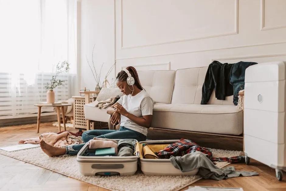 Travel essentials checklist packed into a carry-on bag